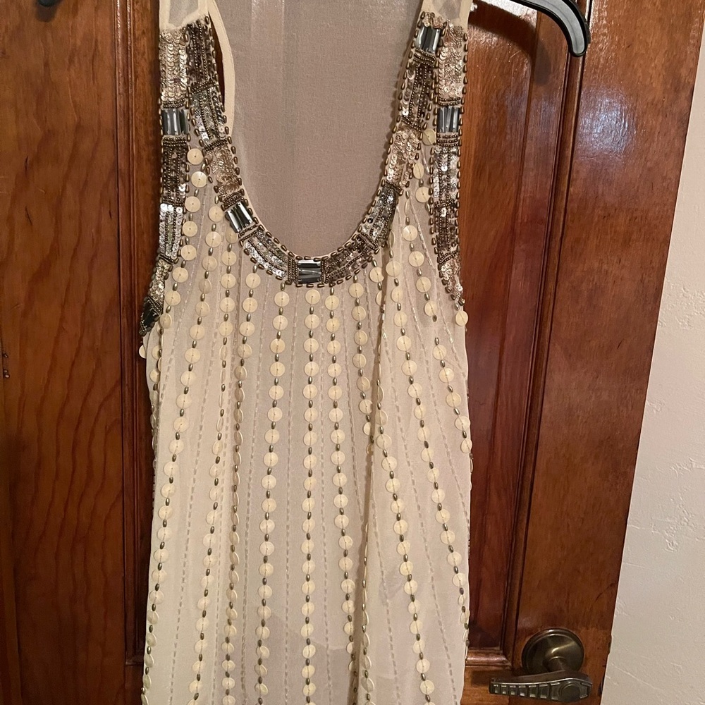 Selling champagne color sequin top